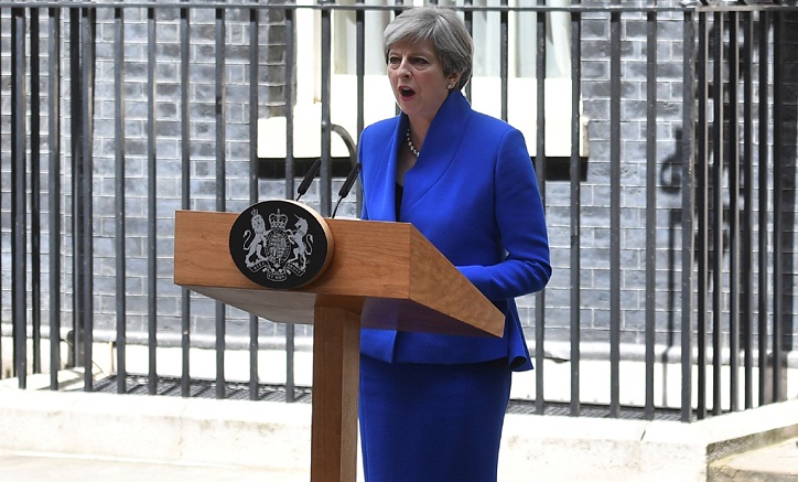 Brussels left waiting as May tries to clinch power deal