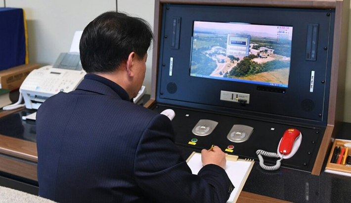 North Korea reopens border hotline with South Korea
