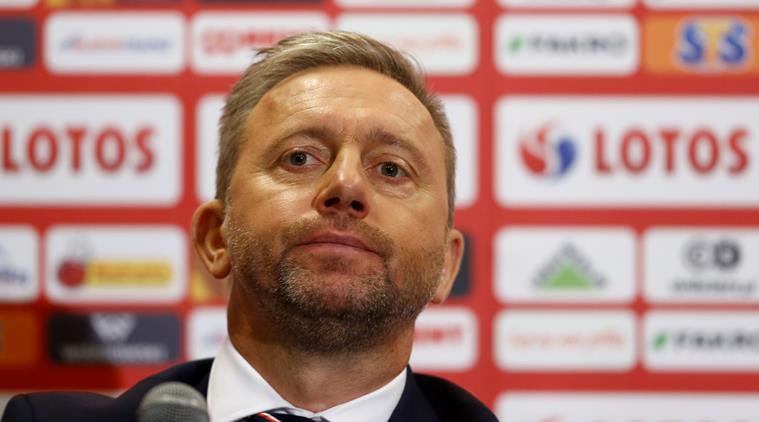New Poland coach vows hard work to give fans reasons for joy