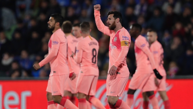Messi scores, Barca beats Getafe to take 5-point lead at top