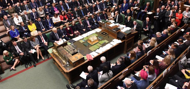 UK lawmakers vote to delay final Brexit decision again