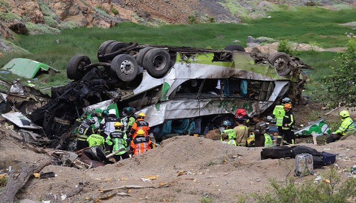 21 killed in north Chile after bus plunges into ravine