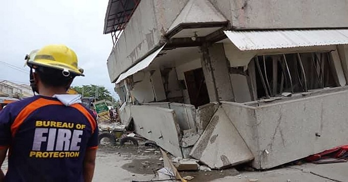 3 dead, 7 missing in building downed by Philippine quake

