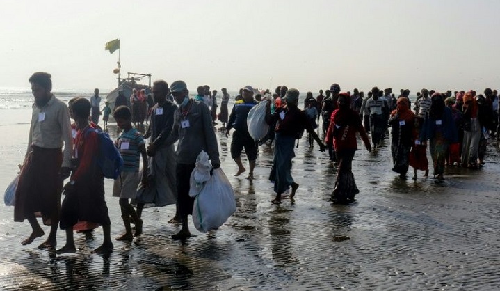 Myanmar sends nearly 200 Rohingya captured at sea to Rakhine camps