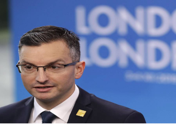 Slovenia's PM steps down, urges EU nation to hold early vote