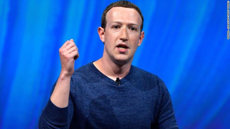 Facebook boss calls for rules on 'harmful content'