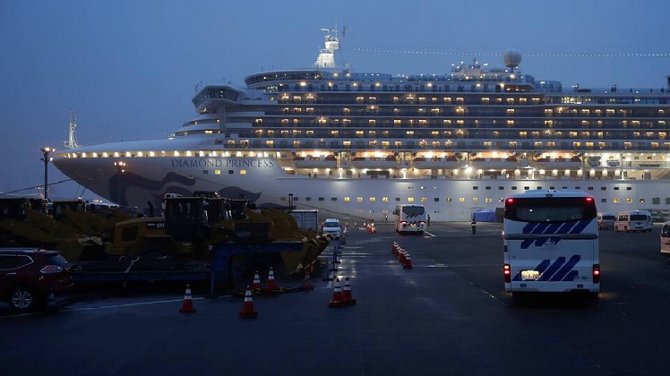 US evacuates from Japan virus ship as China death toll climbs