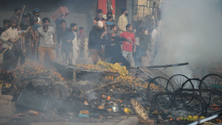 Curfew called in Indian capital after 21 die in sectarian clashes