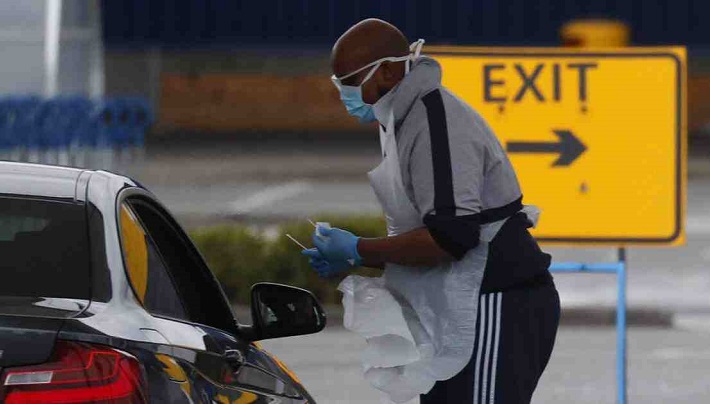 UK vows to 'massively' increase virus testing amid criticism
