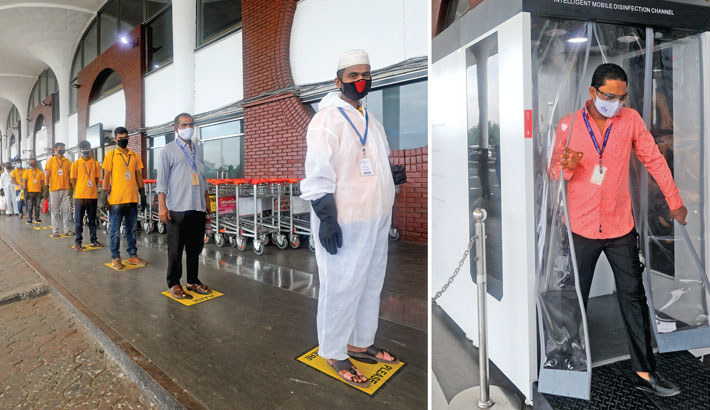 Passengers enter Hazrat Shahjalal International Airport in the capital through a disinfection channel