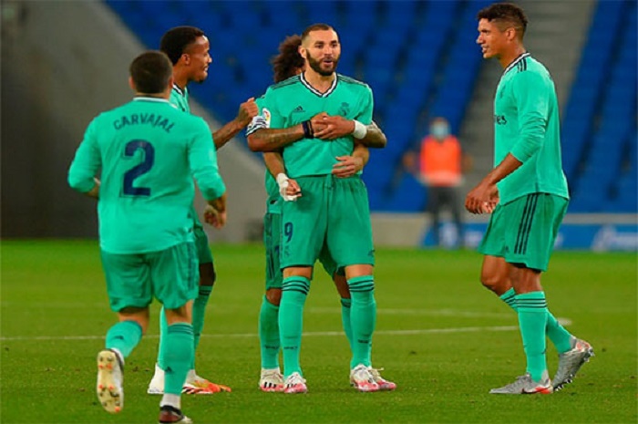 Madrid edge past Espanyol to go two clear of Barcelona