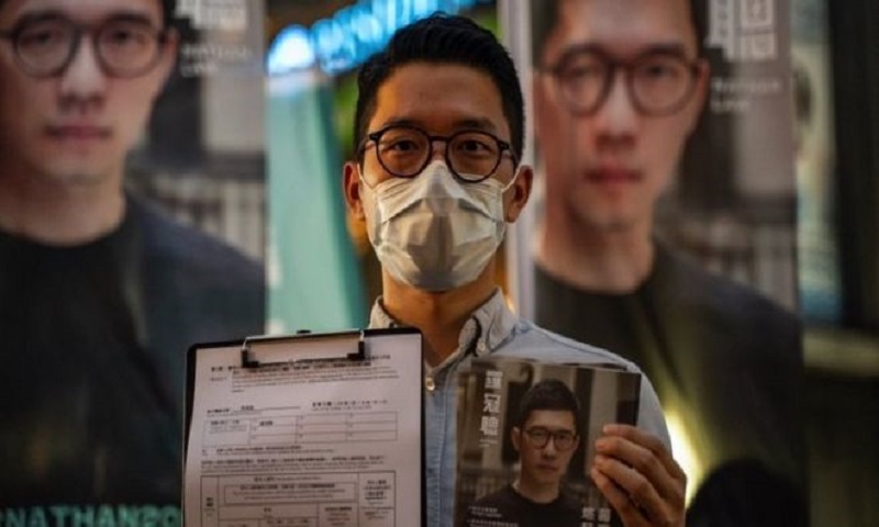 Nathan Law: Prominent democracy activist flees Hong Kong