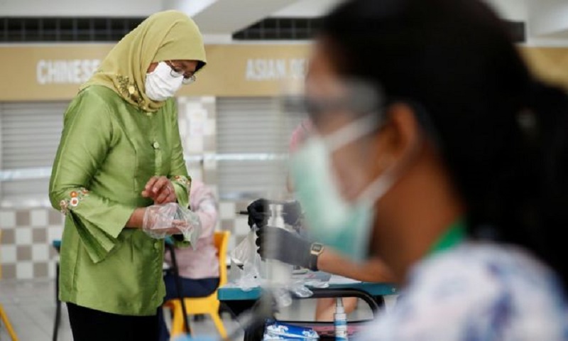 Singapore ruling party wins poll but support falls