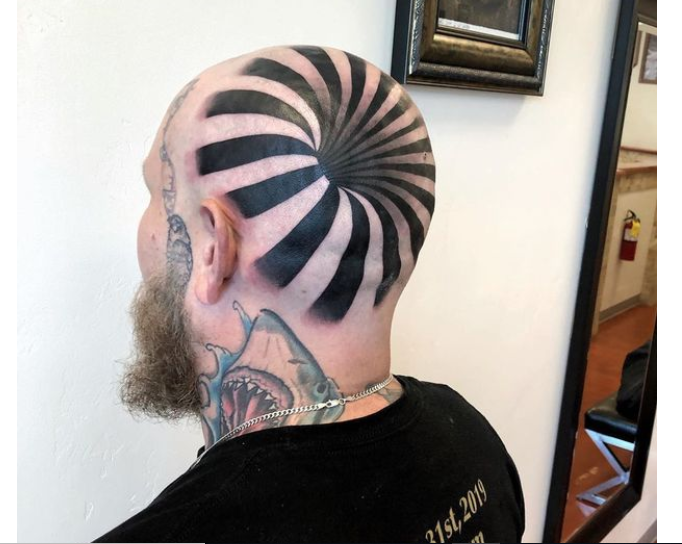 Man's 'insane optical illusion' tattoo looks like giant hole in his head