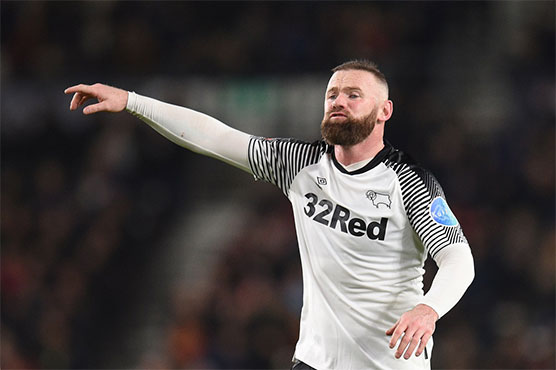 Rooney ends playing career to become full-time Derby boss