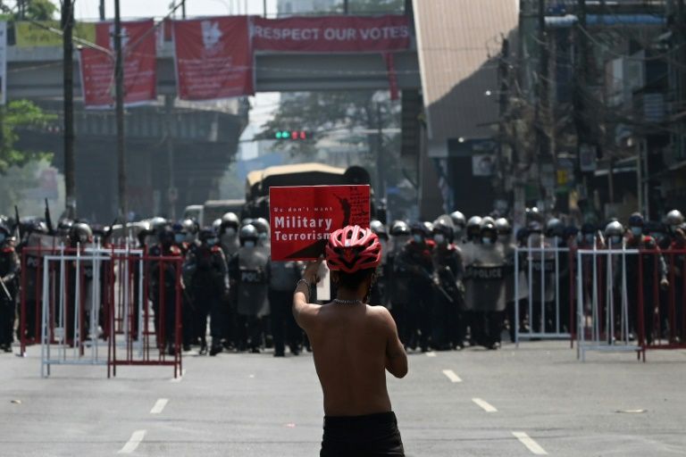 Fear and tension in Yangon as police clear protests
