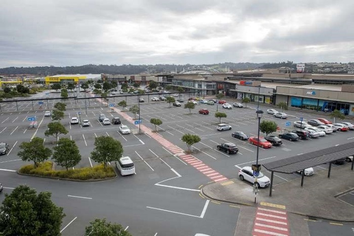 New Zealand’s largest city back in lockdown as Covid lingers

