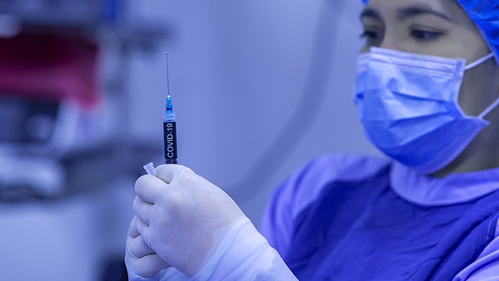 COVID-19: UN experts urge WTO cooperation on vaccines to protect global public health

