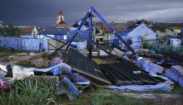 Three dead, dozens injured as rare tornado razes Czech homes