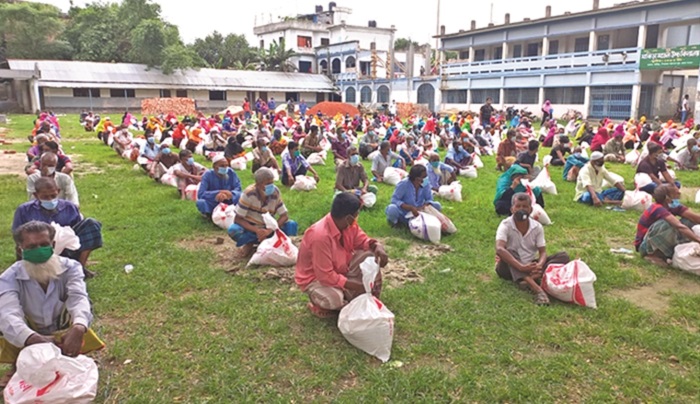 Bashundhara Group distributes relief at different places in Bogura