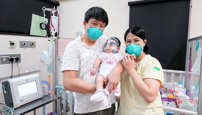 'Smallest baby at birth' home after 13 months in hospital