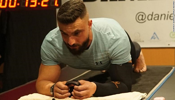 Australian man with chronic pain sets world record by holding plank for over 9 hours