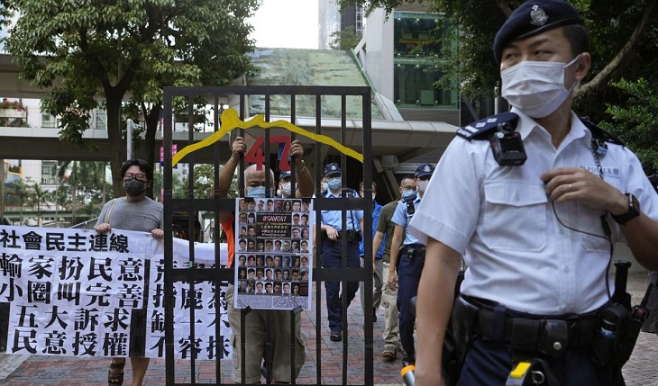 Voters choose new Hong Kong electors under pro-Beijing laws
