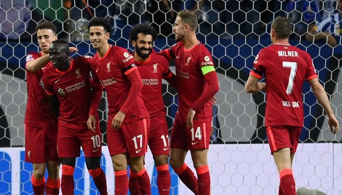 Salah, Firmino shine as Liverpool honour Hunt with Porto rout