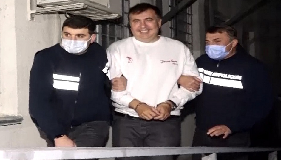 Georgia’s ex-president arrested after returning home