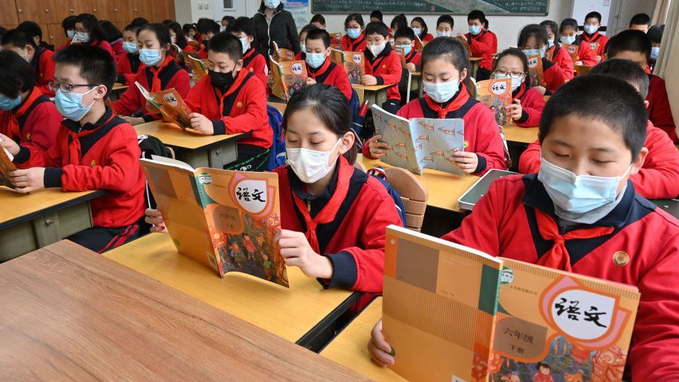 China passes law to cut homework pressure on students