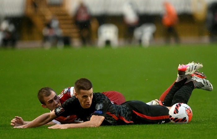 Late own-goal lets Croatia slip past Russia and into World Cup finals