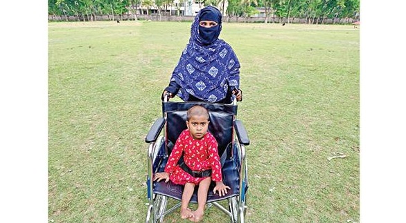 Physically challenged Tahira gets wheelchair from Bashundhara