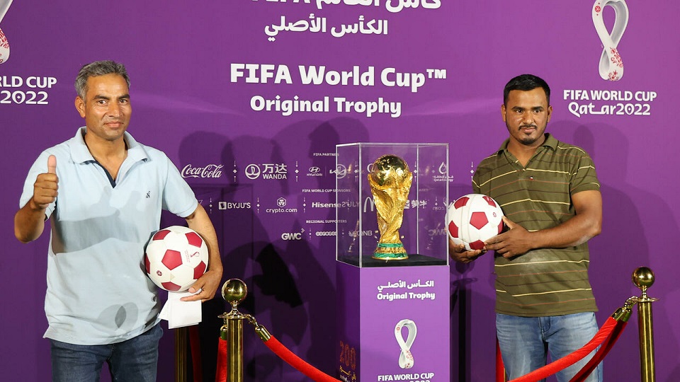 Qatar's migrant army queues for glimpse of World Cup

