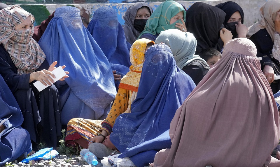 Taliban order Afghan women to cover fully in public