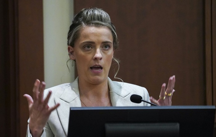 Johnny Depp grabbed Amber Heard by hair, hit her repeatedly: sister