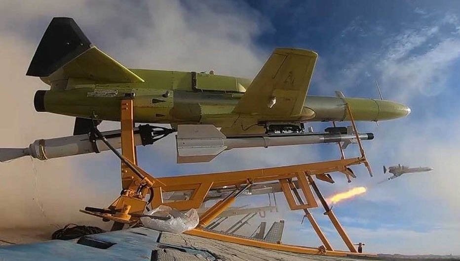 Iran unveils naval drone division as Biden tours Mideast