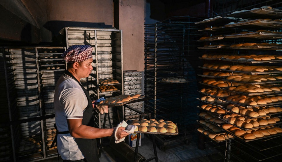 Philippine bakeries shrink 'poor man's bread' as inflation bites