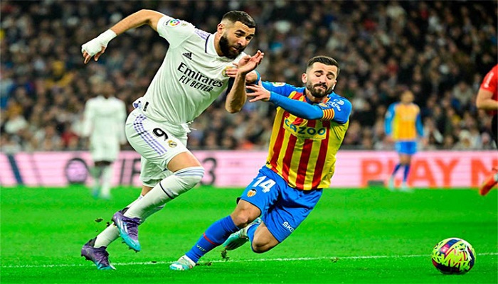 Madrid beat Valencia but Benzema off injured