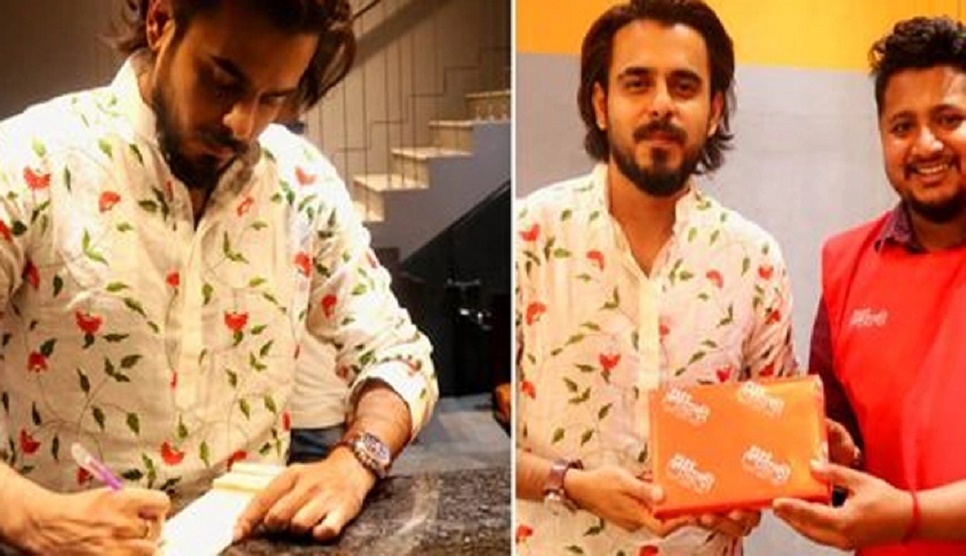 Actor Siam stands beside Bangabazar fire affected people