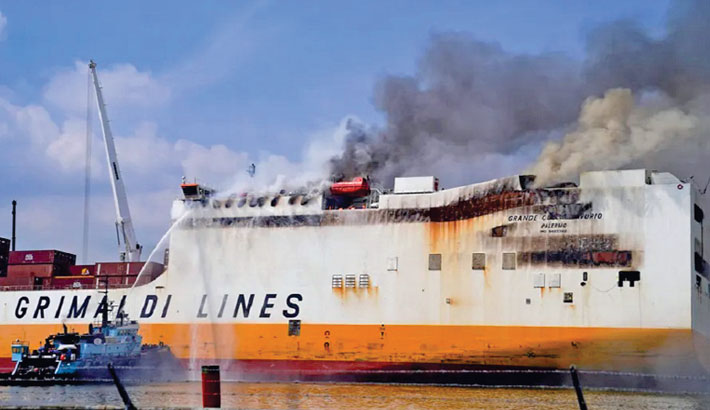 A massive fire that broke out on Wednesday aboard a large cargo ship ...