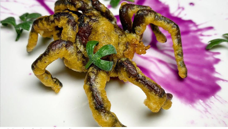 
Giant spiders invade the New York dining scene