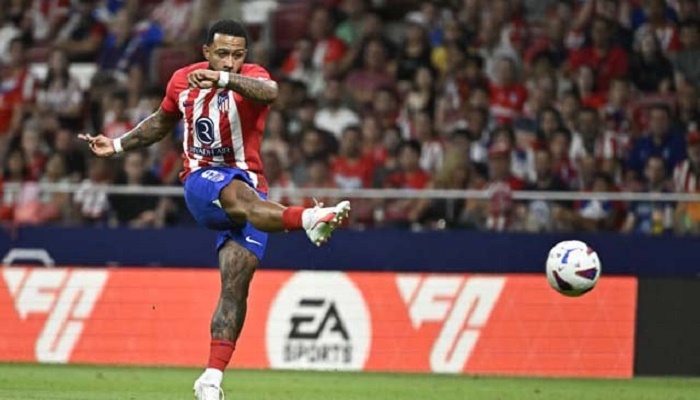 Atletico hit three to take early Liga lead