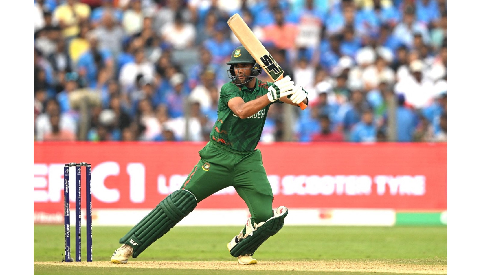 Spinners strike as India hold Bangladesh to 256-8