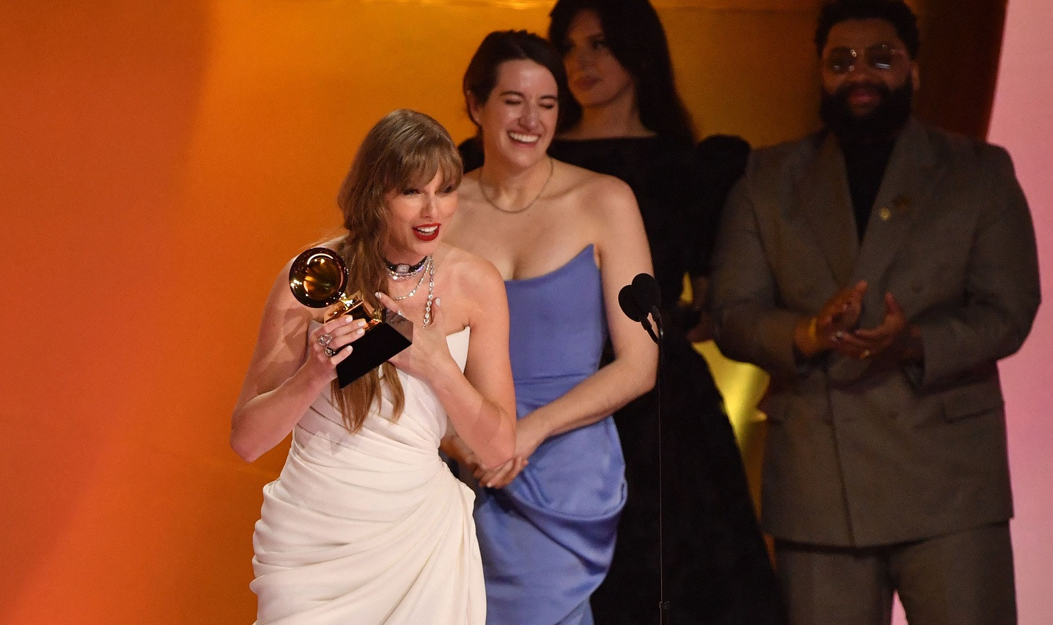 Taylor Swift wins Album of the Year Grammy, breaking record