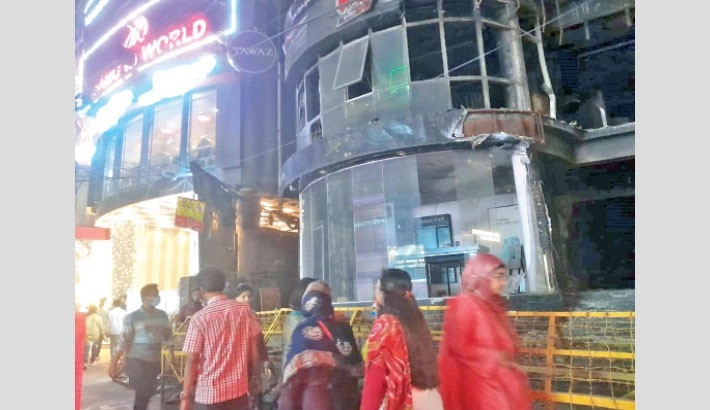 Festivities and a fire’s shadow