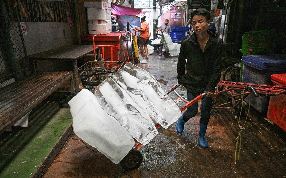 Extreme heat scorches Southeast Asia, bringing school closures and warnings