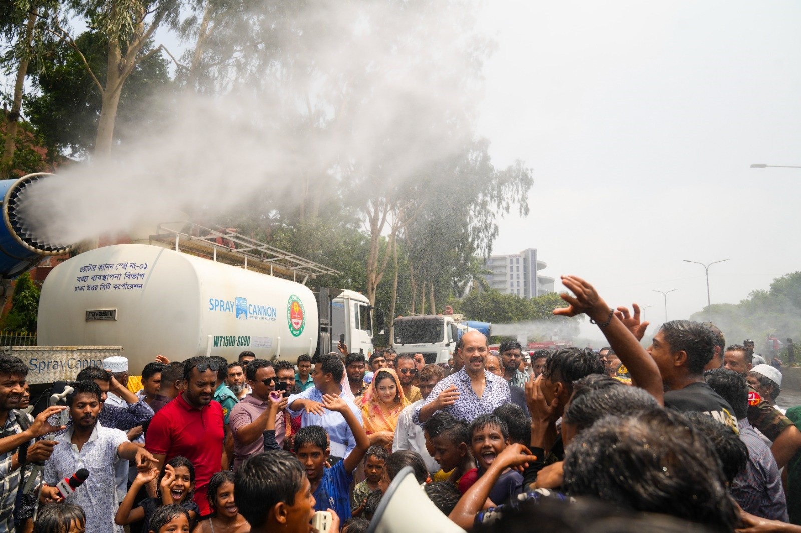 DNCC sprinkling water through spray cannon to mitigate heatwave