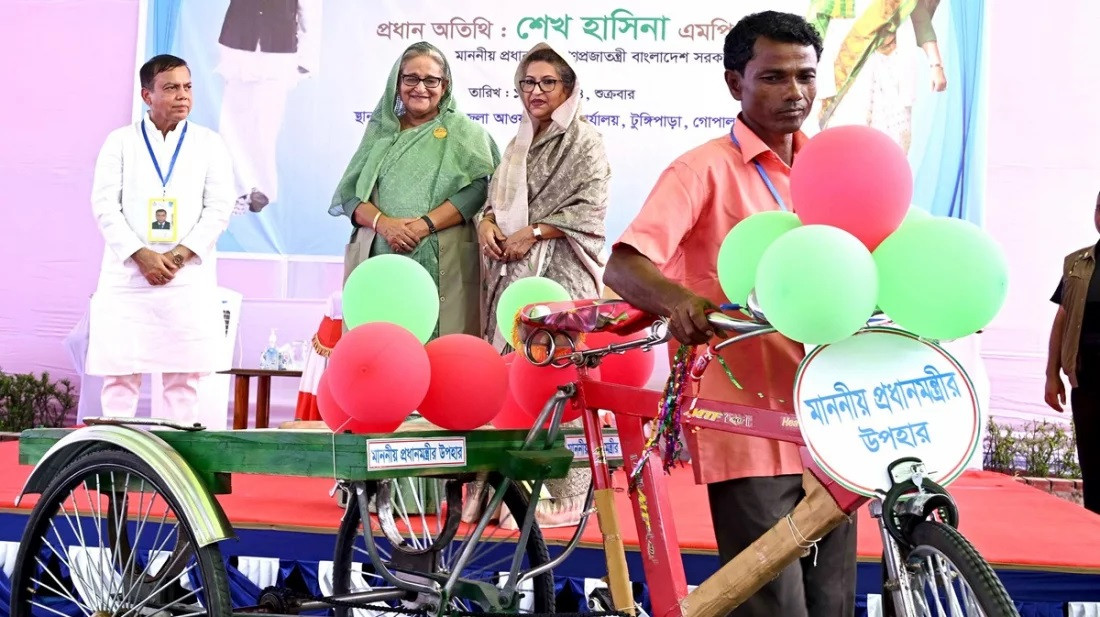 PM distributes relief material to poor people in Tungipara