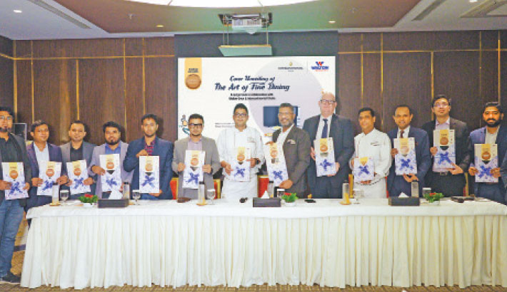 Officials of Walton’s Microwave Oven and InterContinental Dhaka jointly unveil the cover of a recipe book titled “The Art of Fine Dining” at a programme at the hotel in the capital recently. Photo: Courtesy