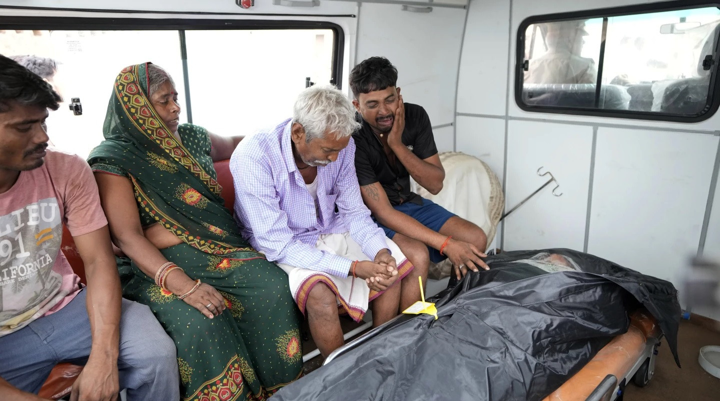 Massive overcrowding, lack of exits and slippery mud contributed to deadly stampede in India